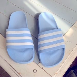 Blue adidas slides